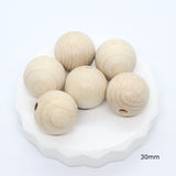 Houten kralen - Klein Atelier