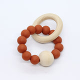 Bijtring met houten kraal - Klein Atelier