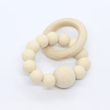 Bijtring met houten kraal - Klein Atelier