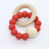 Bijtring met houten kraal - Klein Atelier