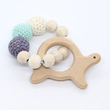 Bijtring met houten figuurtje - Klein Atelier