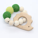 Bijtring met houten figuurtje - Klein Atelier